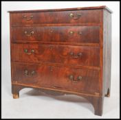 A 19th century Georgian mahogany inlaid chest of drawers having brass swan neck handles with