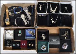 A good group of costume dress jewellery earrings, necklaces, watches and brooches. Please see