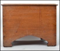 A 20th century apprentice piece oak coffer / blanket box with hinged lid , dove tail show joints