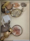 A group of vintage jewellery pendants to include a 9ct gold heart padlock, a gold mourning locket,