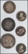 A good group of silver pre decimal coins to include an 18th century Georgian coin and various