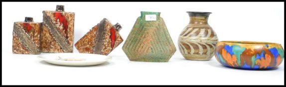 A good group of ceramics to include a group of three graduating fat lava style vases of