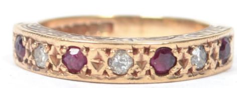 A hallmarked 9ct gold invisible set ruby and diamond ring seven stone ring, weighs 2.3 grams size