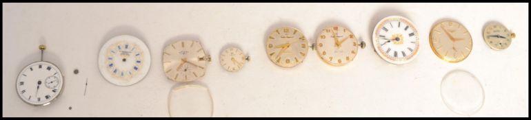 A collection of vintage watch faces to include a Longines 17 Jewels No 12798918, Buren Grand Prix,