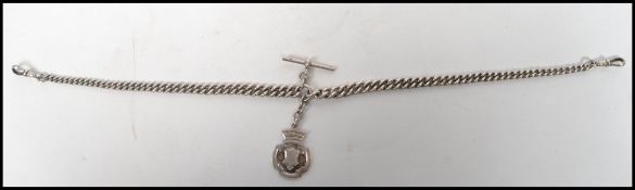 An early 20th century silver hallmarked pocket watch Albert chain by Herbert Bushell & Son Ltd