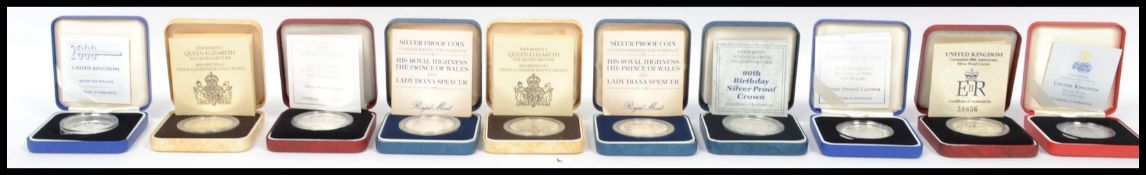 A collection of ten Royal Mint United Kingdom silver proof £5 five pound crown coins to include
