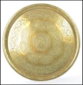 A fabulous 20th century Arts and Crafts large copper charger of Celtic influence, geometric