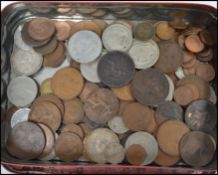A collection of coins and tokens to include British and the rest of the world. Dating from the