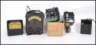 A collection of vintage 20th century retro industrial scientific amp-meters to include General