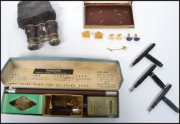 A good group of vintage items to include a pair of French opera glasses in case, a Parker Hale gun
