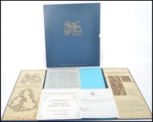 A complete Betjemans 36 silver proof coin set complete in original book display with outer sleeve.