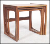 A G-Plan retro teak wood 1970's graduating nest of tables in the Quadrille pattern. The tables