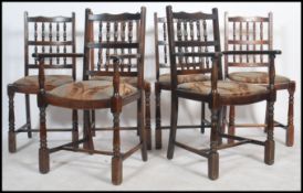 A set of 4 1930's Art Deco dining chairs being raised on block and turned legs united by