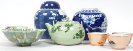 A mixed lot of Oriental ceramics to include a pair of Chinese prunus pattern blue and white ginger