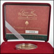 A Royal Mint Queen Elizabeth The Queen Mother Centenary Year 22ct Gold Centenary Crown Five Pound