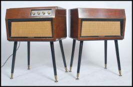 A vintage 20th century walnut cased Dynatron Mazurka record player deck with matching amplifier,