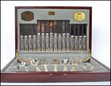 A vintage 20th century Viners silver plated canteen of cutlery in the Kings Pattern entitled Kings