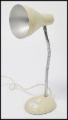 A vintage retro 20th century goose-neck / anglepoise desk lamp. Raised on a circular base with a
