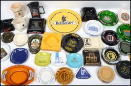 A collection of vintage 20th century advertising point of sale breweriana ashtrays to include