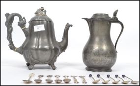 An unusual 19th century pewter teapot with the handle formed as an entwined asp / snake sneaking