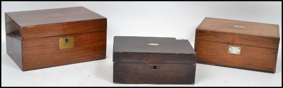 A group of three 19th century Victorian boxes, one being a walnut writing slope with fitted interior