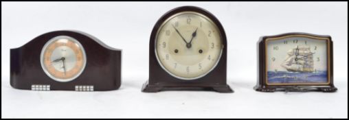 A group of three 20th century Art Deco clocks of bakelite construction to include Scout, Shipping