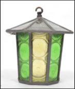 A 20th century leaded glass porch lantern of octagonal form having a crackle pattern lid with