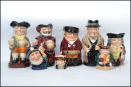 A collection of Royal Doulton 20th century ceramic Toby and Character jugs to include, Old Salt
