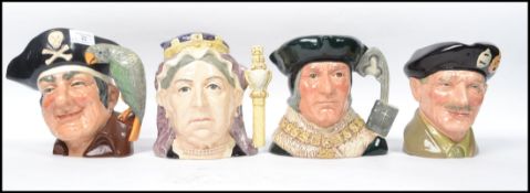 A group of four vintage 20th century Royal Doulton Character jugs to include Queen Victoria D6816,
