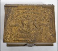 A vintage 20th century brass advertising vesta case in the form of a book with notation for D.