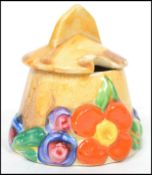 An early 20th century Clarice Cliff ' My Garden ' mustard pot with marks to the base, complete