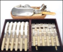 A group of fine vintage silver plated flatware to include sifter spoons, ladles, tongs, caddy