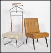A 20th century tan leather type easy chair on angular legs together with an unusual seated valet