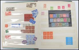 GB stamps. large stockbook with range of QEII mint.Many in part sheets/large blocks. Commemoratives,