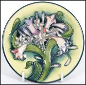 A Moorcroft ceramic tube lined coaster pin dish de