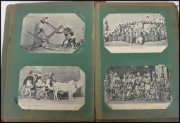 An Edwardian postcard album containing postcards from the early 20th century with views from