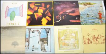 A collection of long play vinyl LP records by Genesis to include A Flick Of The Tail, Selling