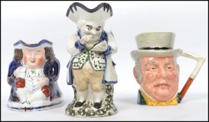A 19th Century Staffordshire Toby Jug in form of a pot-bellied gentleman taking snuff with black eye