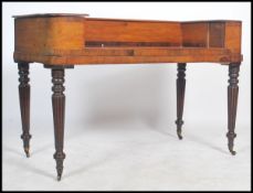 A 19th century mahogany crossbanded square pianoforte being converted to a desk having hinged