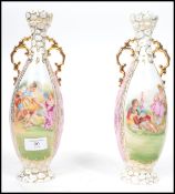 A pair of 20th century continental vases of amphora form and in the manner of Dresden having