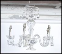 A mid 20th century Czechoslovakian made five point chandelier adorned with glass droplets. The