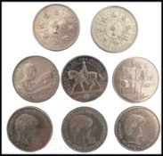 A group of eight commemorative £5 coins to include Princess Diana, The Princes Trust etc please