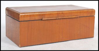 A 1930's Art Deco walnut blanket box chest of rectangular form with hinged top opening to reveal
