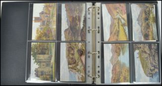 A vintage postcard album containing a collection of approximately 200 postcards by artist A.R.