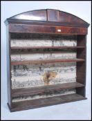 An 18th century Georgian mahogany inlaid open window bookcase cabinet having 4 shelves with arched