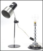 A vintage mid 20th century Italian chrome bobbin effect table lamp together with another chrome desk