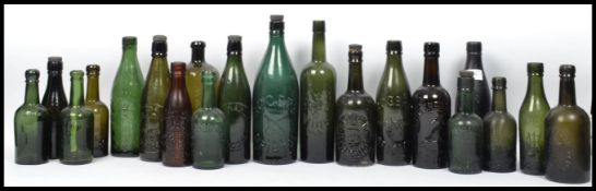 A good group of vintage 20th century advertising point of sale glass beer bottles to include many