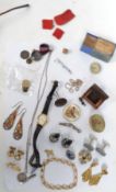 A group of vintage costume jewellery to include yellow metal earrings, studs, stone cuffs,