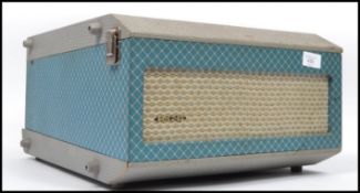 A vintage mid 20th century two tone R.G.D portable record player, fitted with a four speed  U38