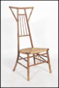 A 19th century Victorian Arts and Crafts Aesthetic movement reed seated nursing / prie diau chair,